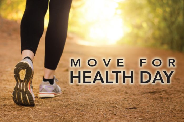 Move for Health Day poster: Shows someone walking down a sunny trail