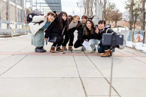 ESL study tour students pose for a group photo in downtown Kelowna