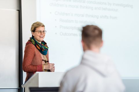 Psychology Department Professor Danielle Fullerton engages with her students during a lecture
