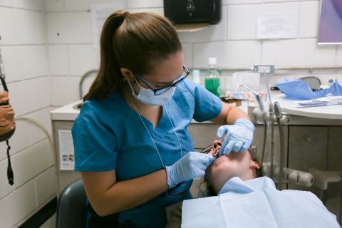 Certified Dental Assistant students work hands-on in clinical environments