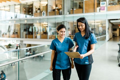 Practical Nursing students walk down the hallway