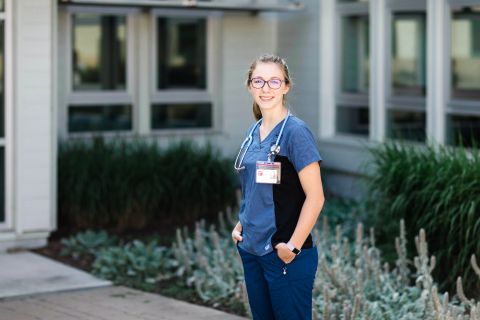 Practical nursing student standing outside