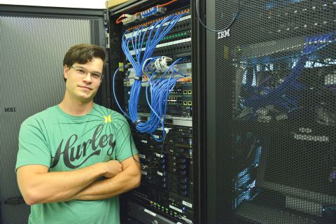 Network and Telecommunications Engineering students work with server infrastructure