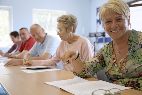 Group of older adults in a classroom