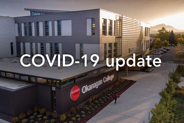 Text of "COVID-19 update" is overlain on a photo of Kelowna Trades building