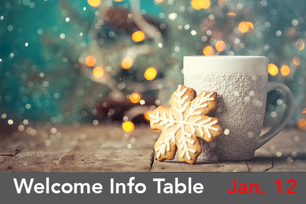 Image of a coffee mug and winter cookie on a wooden table.