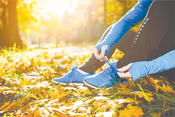 Fall leaves and blue sneakers