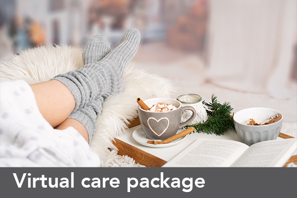 Fluffy socks with marshmallow cocoa and a book; text: Virtual care package