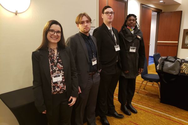 Four OC students at the Model NATO conference.