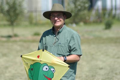Norm Corbett holding a kite.