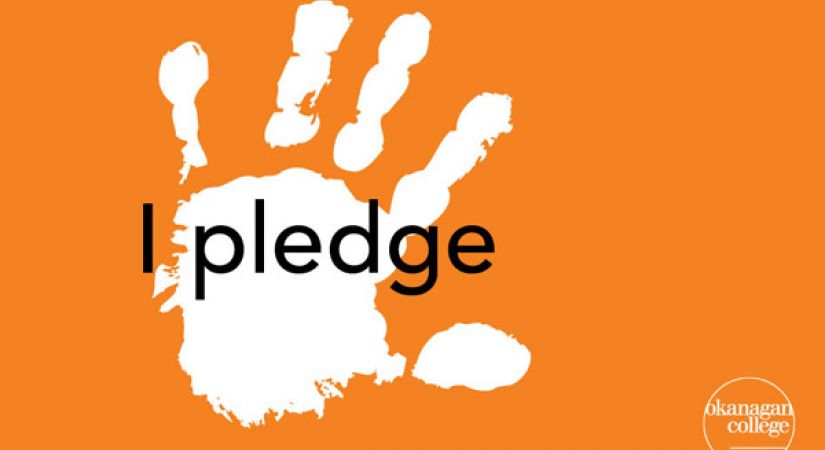 Handprint with the words "I pledge" over an orange background