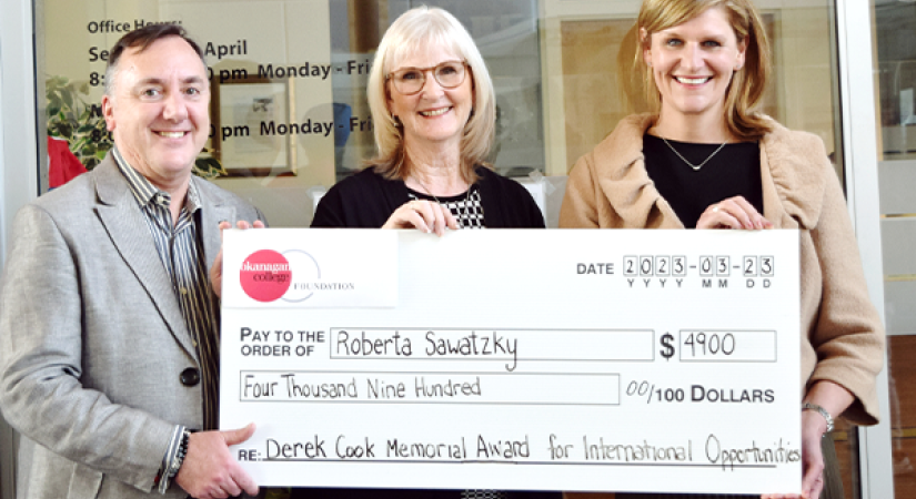 Roberta Sawatzky is presented with a check for the Derek Cook Memorial Award.